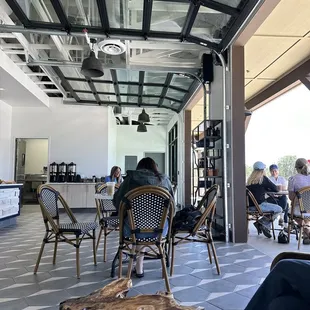 Nice open air concept-- love the garage doors!