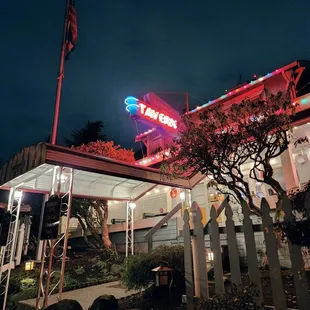 the exterior of the restaurant at night