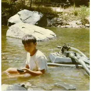 Myself in 1974, learning to dredge