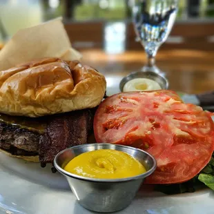 BIG ASS BURGER
 Applewood Bacon, Poblano Pepper, Cheddar, Lettuce, Tomato, Onions, Pickles and House Cut Fries