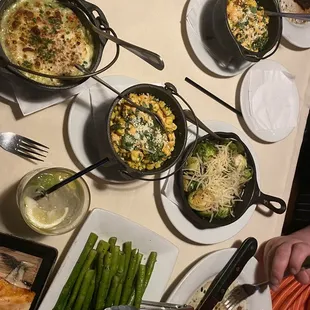 Street corn, mac n cheese, asparagus, Brussel sprouts.