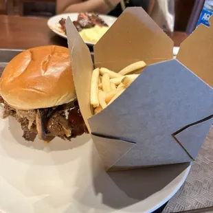 Pulled pork sandwich and French fries
