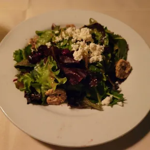 a plate of salad on a table