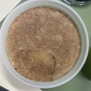 Creamed honey tub freshly opened.