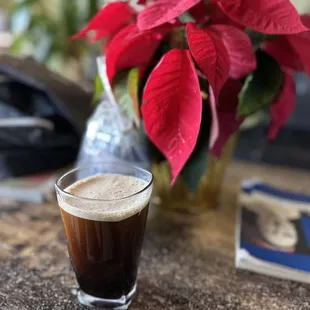 Nitro Cold Brew. Has a hint of sourness and freezer burn taste, but overall drinkable. Gives caffeine!