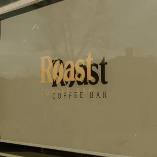 reflection of a roast coffee bar