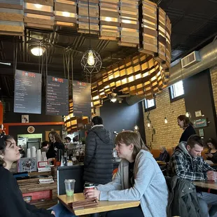 a group of people sitting at tables