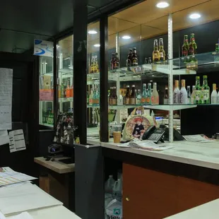 a bar with a lot of bottles