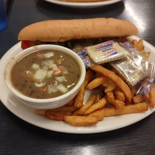 Philly Cheese Steak, bean soup and fries.