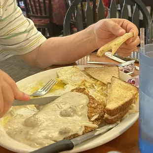 Chicken Fried Steak, hash browns eggs, toast, gravy.