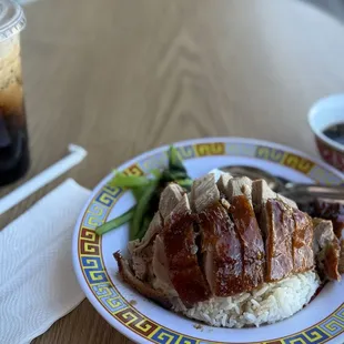 Roasted Duck Over Rice and Thai Iced Coffee.  Legit Even the utensil mouth feel made me think of childhood memories in Thailand.