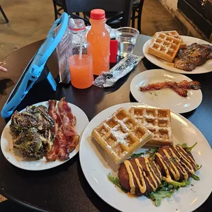 Salmon croquettes, waffles, sticky bacon, ribeye, and brussel sprouts