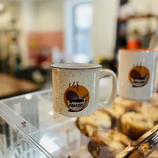 a cup of coffee and pastries