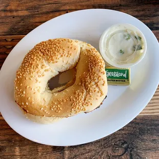 Sesame seed bagel with chives cream cheese.