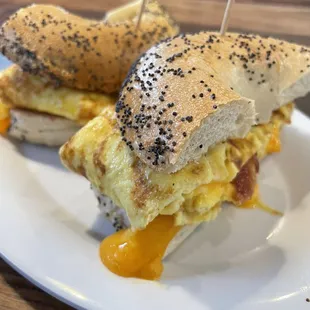Breakfast sandwich on a poppy bagel.