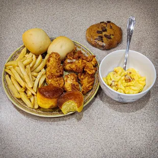 Chicken Fingers with Fries and Mac and Cheese plus Rolls, Cornbread and a cookie.