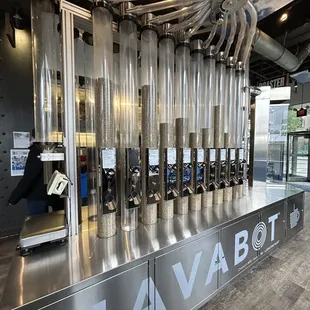 a man standing in front of a machine