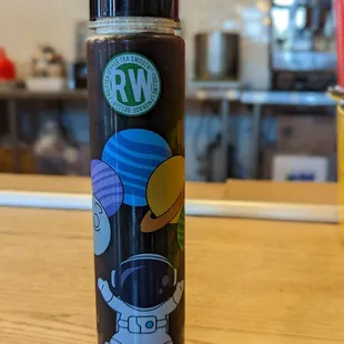 a close up of a coffee bottle