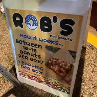 a sign for a donut shop