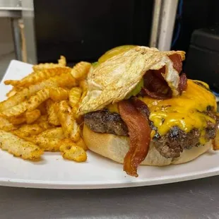 our shipwreck burger is great for the true burger lovers. deluxe with bacon guac fried egg and cheddar cheese