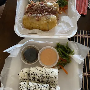 two trays of food on a table