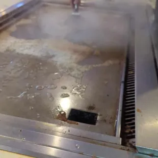 The cleaning of the table.