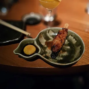Tsukune - be sure to mix the egg with the sauce.   Dip your chicken to eat.