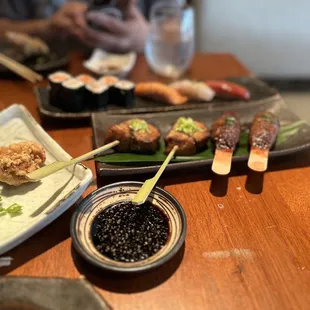 Karaage, pork skewers and wagyu skewers