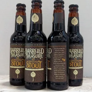 three bottles of barreld treasure stout