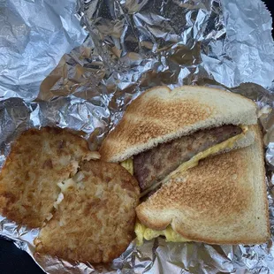 Sausage egg and cheese sandwich with hash brown