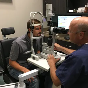 A Patient getting an eye exam and new eye glasses at Dr. Zoellner&apos;s new office in Tulsa!