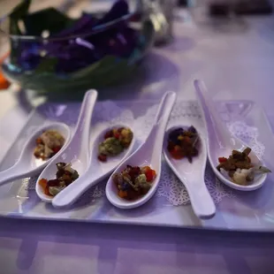a plate of appetizers on a table