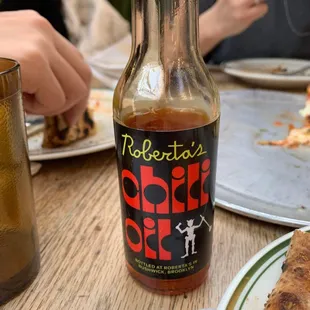 Complementary chili oil - yum! Add it to your pizza! Not too spicy.