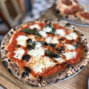 Margherita pizza (I promise it's not burnt)