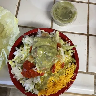 The hot sauce and guacamole added