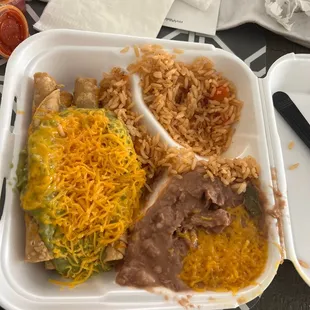 Taquitos platter with beans and rice