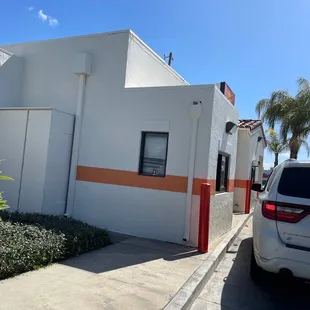 a car parked in front of a building