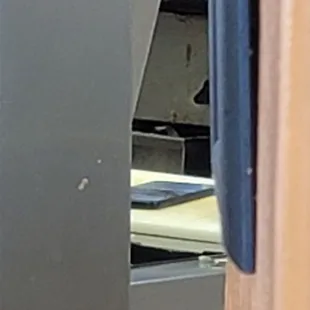 Cell phone on cutting board