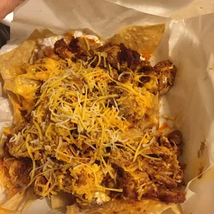 This is how I got the nachos with cheese that was not fully melted and it looks like a 1/4 of it was missing.