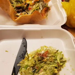 The Mr. Ordered a taco salad with *no* guac. That pile of green..guac they decided to give him anyway. Not happy.