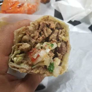 Very tasteful burrito.  Amazing . Meat was so tender .