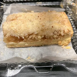 a piece of pie in a plastic container