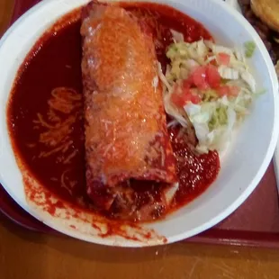 Roberto&apos;s red chile con carne smothered burrito. Overload of cumin, or something, ruined the flavor. Rate it a &quot;C-.&quot;