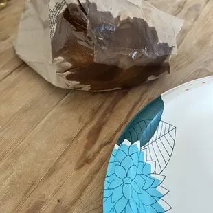 a paper bag and a plate