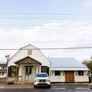 a van parked in front of it