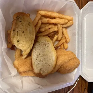 My two catfish fillet with two garlic bread and fries