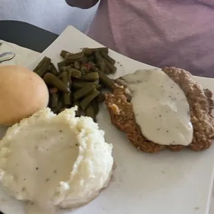 Chicken fried steak with two sides