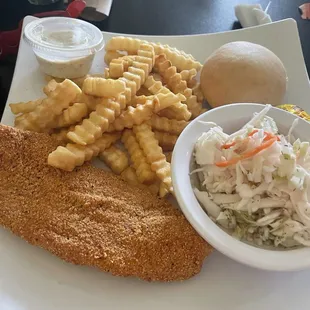Fried catfish fillet with fries and slaw