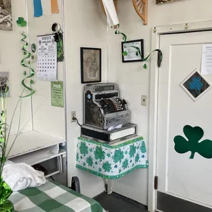 an old typewriter in a kitchen