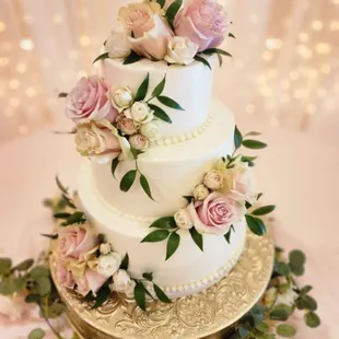 Pretty flowered simple wedding cake 3 tier.